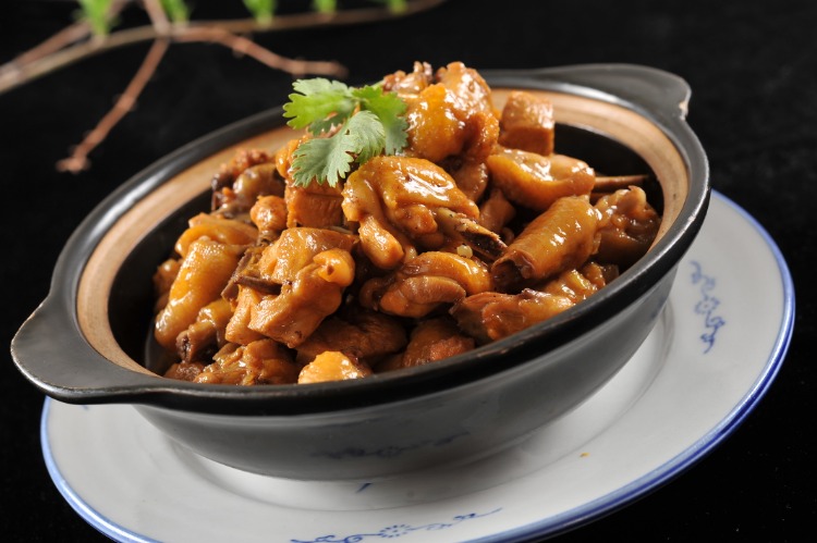 A cooked dish served in a black bowl