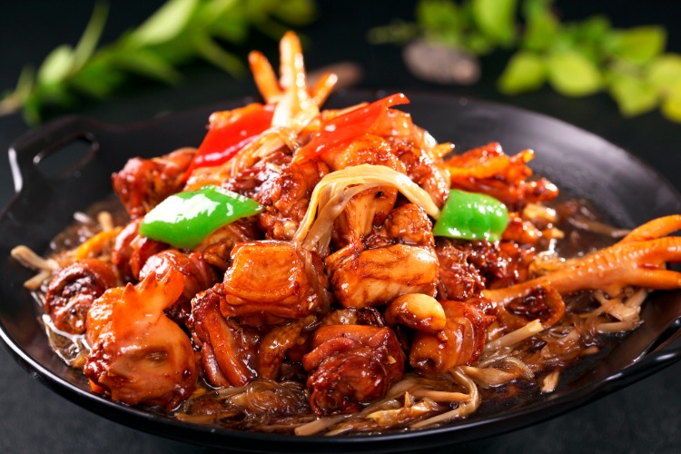 A stir-fried dish with peppers and vegetables
